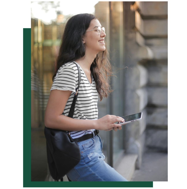 Woman using smartphone in street